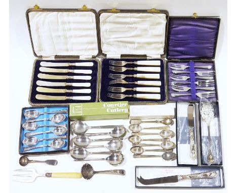 Quantity of assorted silver plated flatware, some in original boxes, to include spoons, butter knives, etc&nbsp;