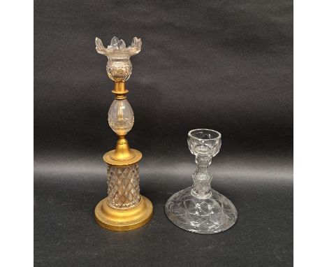 Georgian-style cut-glass and gilt-metal mounted candlestick and a baluster cut-glass candlestick, the first with petal shaped