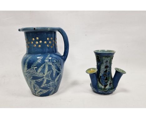 C H Brannam Art Pottery Barum blue-ground triple spill vase and a Lauder Barum pottery blue-glazed puzzle-jug, the first date