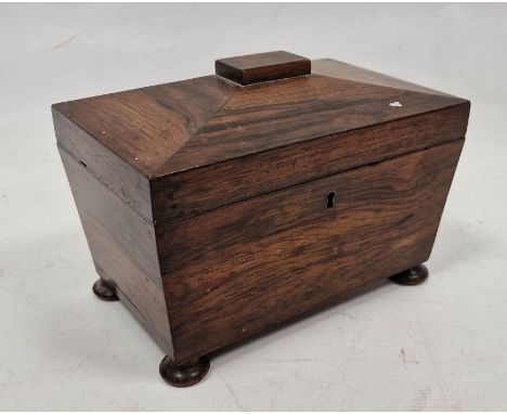 Victorian rosewood tea caddy&nbsp;of sarcophagus form, the lid opening to reveal two lidded tea compartments, raised on four 