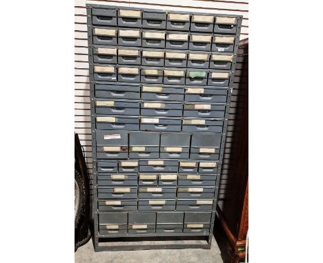 A metal engineer's filing/storage cabinet, measuring approx. 168cm high x 90cm x 29cm, a label attached to the top reading 'A