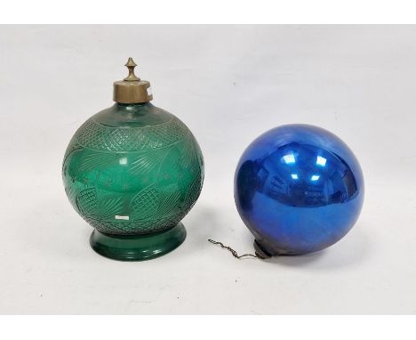 Late 19th century engraved green glass globular lamp shade and a 19th century iridescent blue witches ball, the first engrave