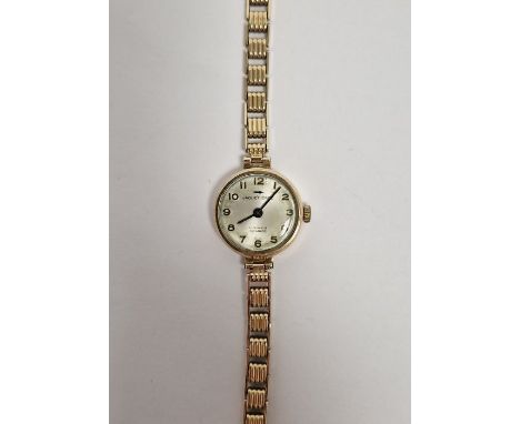 Vintage Jacquet-Droz 9ct gold lady's wristwatch, the circular dial having Arabic numerals denoting hours, 17 jewel manual win