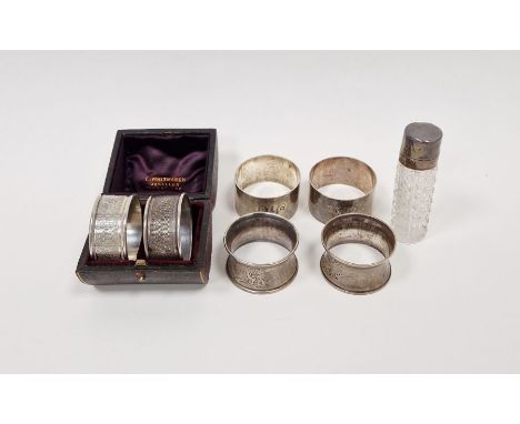 Pair of silver engine turned napkin rings, in original fitted box, hallmarked Birmingham 1948 by CJB, together with four othe