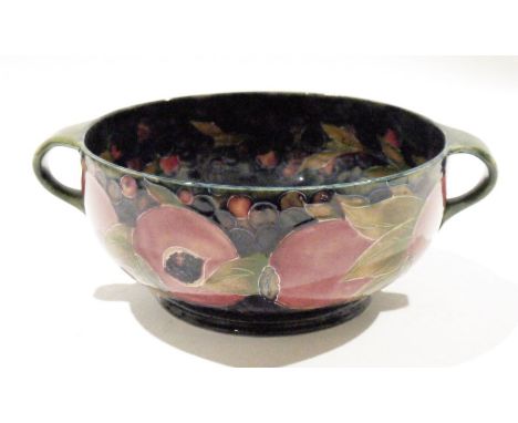 Moorcroft Pomegranate pattern two-handled bowl, impressed marks and green signature to base, tubelined with seeded and berrie