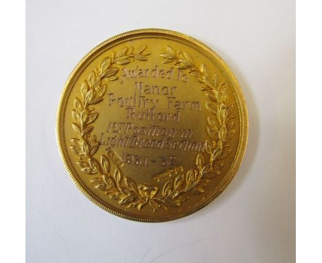 Gold 9ct medal awarded 1931 - 1932 to Manor Poultry Farm for first position in the light breeding section by Lancashire Count