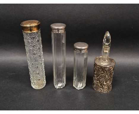 Victorian silver-mounted cut-glass perfume bottle and stopper and two silver-topped cut-glass jars and a George V silver-plat