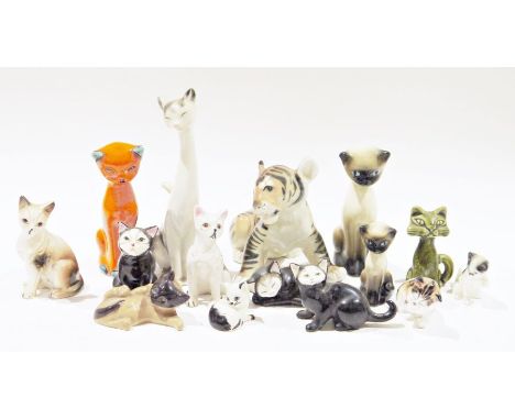 Collection of 20th century porcelain models of cats, including: a Royal Doulton tortoiseshell kitten, HN 2583, printed green 