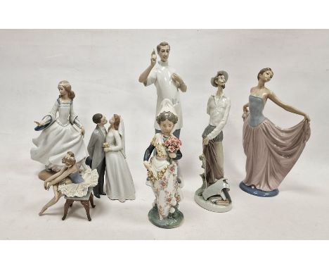 Seven Lladro figures, printed and impressed marks, including: a dentist, a group of bride and groom, figures of dancers and o
