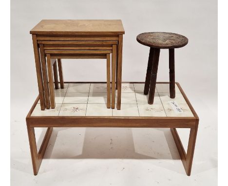 Nest of three oak occasional tables of rectangular form, raised on square legs, largest measuring 46cm high x 48cm wide x 31c