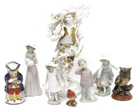  Four 20th century Nao porcelain figures, a Beswick model of a robin, an Allerton's pottery toby jug and other items, the woo