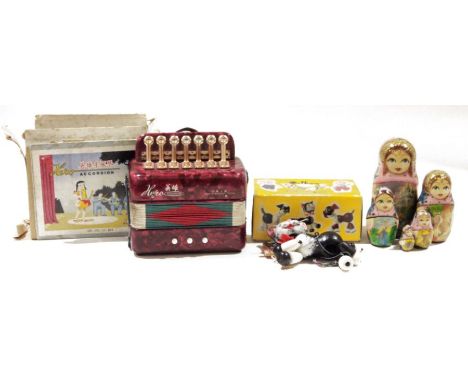 Pelham puppet 'Cat', in original box, a toy accordion and a Russian matryoshka doll (3)&nbsp;