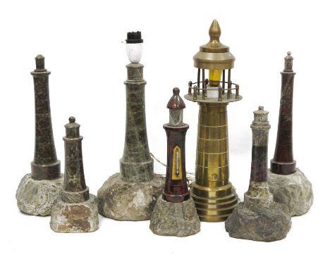 Extensive collection of Cornish Serpentine model lighthouses&nbsp;in various materials, to include brass lighthouse table lam