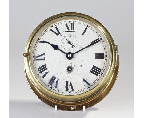 Early 20th Century ships clock, the whit enamel dial with black Roman hours, subsidiary seconds dial, 19cm wide
