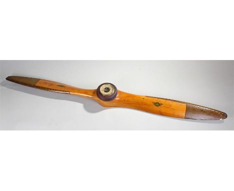 Fine laminated mahogany two-blade propeller with rivetted brass leading edge and tips, by Sensenich Bros., the boss stamped P