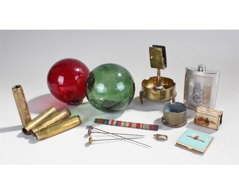 Mixed Maritime and military objects, to include a clip with a ship, two glass balls, shell casings, hip flask, hat pins, RAF 