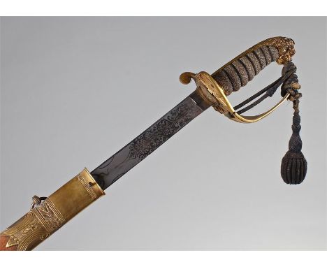 Naval officers sword, the etched steel blade with anchor, shagreen grip, gilt lion head and basket, together with the leather