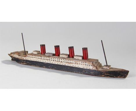 Scratch built model of the Titanic, with four red painted funnels, painted white and black body, 29cm long