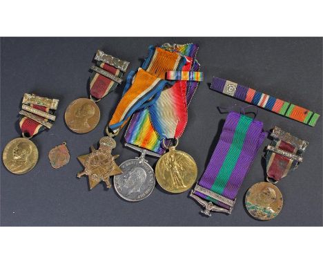 First War trio, awarded to 54757 GNR. A.J. MALLOWS. R.F.A. together with three attendance medals and a bar for S.E. Africa 19