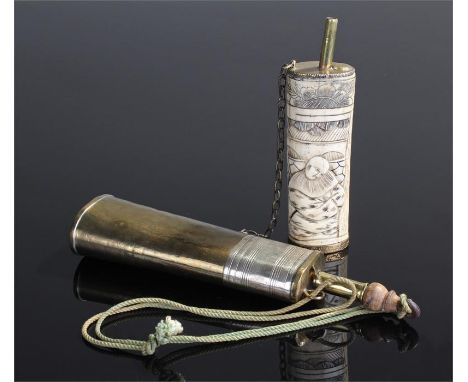 Two powder flasks, to include a Japanese bone carved example and a copper flask, (2)