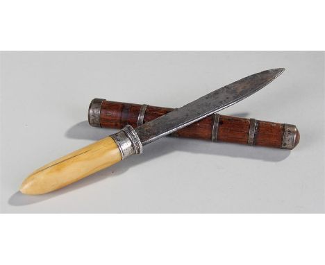 19th Century Burmese dha, the ivory handle and silver collar, with wooden scabbard, 22.5cm long