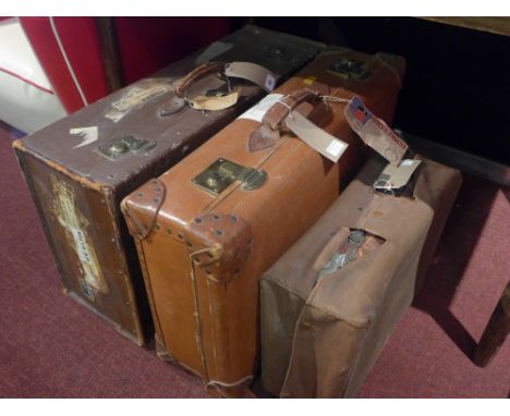 Three vintage suitcases, one being a vanity case containing silver top bottles (A/F) catch broken on one side, another having