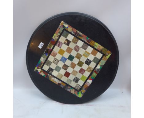 A vintage marble table top chess board with specimen stone inlay Diameter 62cm