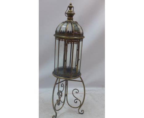 A gilt metal dome storm lantern on stand, H:108cm