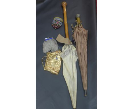 Two vintage parasols and a collection of purses