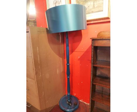 A contemporary blue painted standard lamp.