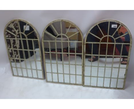 A set of three arch top garden mirrors, 60cm x 36cm