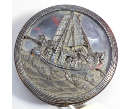 A 18th century Chinese export tortoiseshell snuff box. The top deeply carved with figures on ships on choppy waters. The base