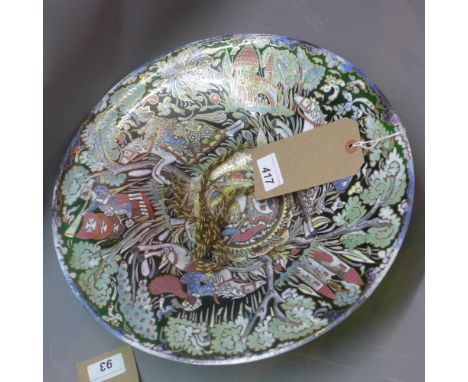 A large Czech green glass bowl, painted with a continuous design of riding noblemen in landscape, diam. 35cm