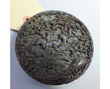 An 18th Century Chinese carved tortoiseshell snuff box the top deeply carved figures on horseback in a woodland scene. The ba