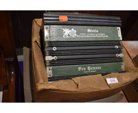 An early 20th Century German button Accordion , possibly original box