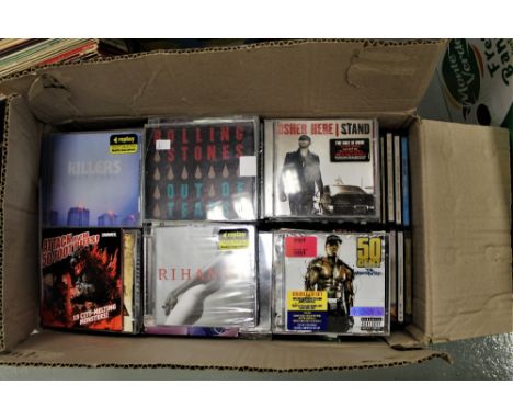 A lot of one hundred and thirty compact discs,rock,pop,dance and more.
