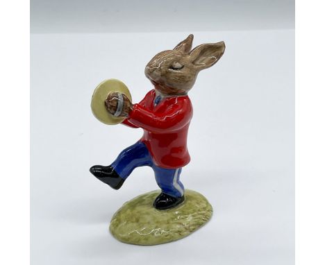 With a red coat and blue pants, this adorable figurine marching happily along with his cymbals. Royal Doulton and Golden Jubi