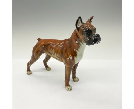 This fierce looking dog is modeled in rich brown and white color with black details like muzzle, eyes, and ears. Goebel W. Ge