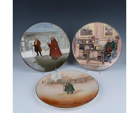 This lot of wall plates feature three different scenes. One is of Tony Weller from the Dickens series in a green overcoat in 