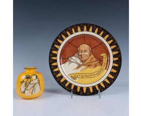 A plate featuring the monk in the center surrounded by an abstract art rim, and a yellow vase depicting the monk in the cente