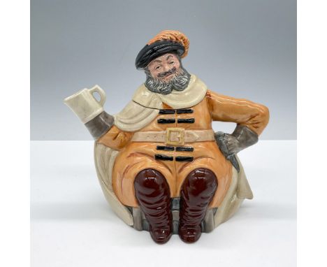 Glazed finish. Features a fun teapot with the character in orange clothes and maroon boots holding a teacup. Royal Doulton ba