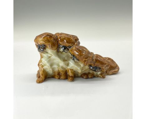 These adorable porcelain puppies are modeled in a beautiful rich caramel-brown color with a cream-colored chest. Royal Worces