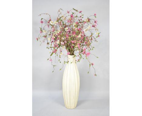A Large Ceramic Vase Containing Artificial Flowers, 70cms High 