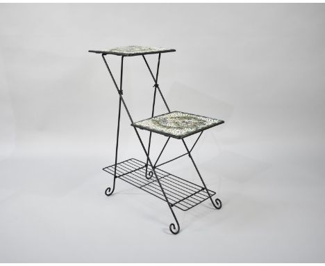 A Wrought Iron and Mosaic Two Tier Off Set Plant Stand with Stretcher Shelf, 57cms Long 