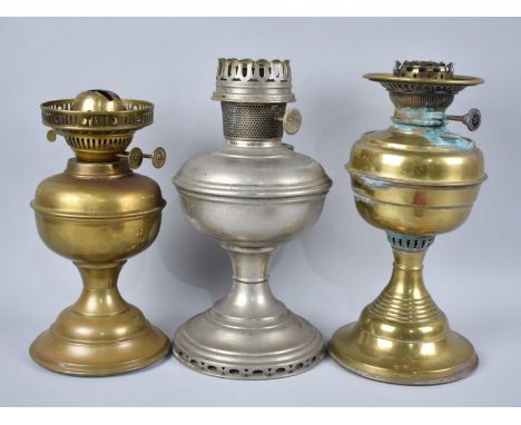 A Collection of Two Brass and a Single Aladdin Oil Lamp Base 