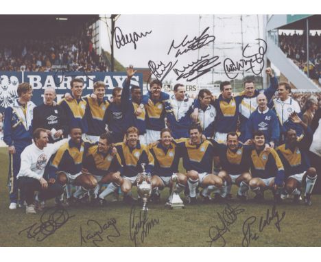 Autographed LEEDS UNITED 1992 16 x 12 Photo : Col, depicting Leeds United players posing with the First Division trophy at El