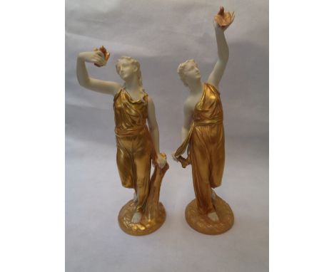 Royal Worcester, Pair of Figurines Liberty and Captivity C.1900, the ivory glazed Maidens with shot enamel draped clothing on