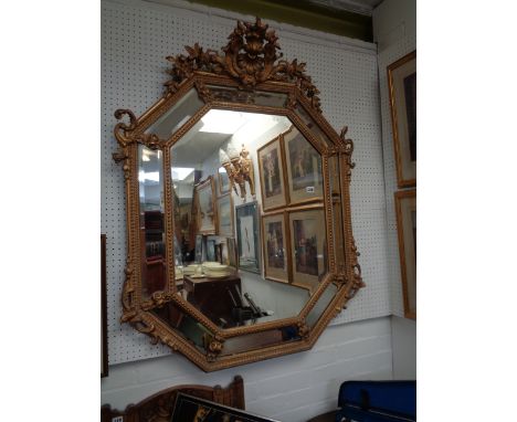 Impressive Early 19thC Gesso Framed Isogonal Octagon wall mirror with surmounted foliate pediment above panel sides with bead