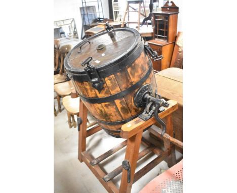An antique butter churn on stand, bearing plaque for Richardson &amp; Co, Royal Societies