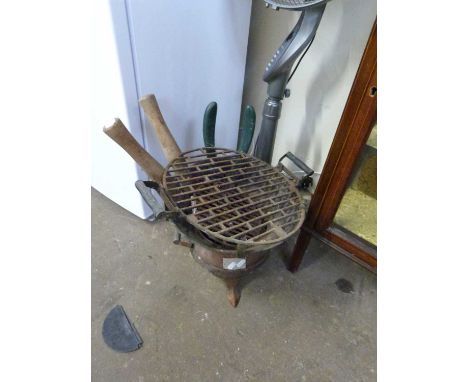 Cast iron pot belly barbecue and garden tools
